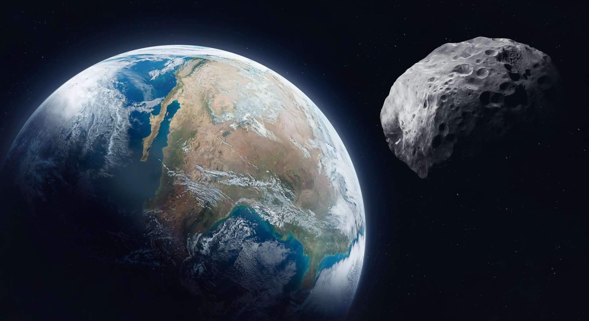 Illustration d'un astéroïde frôlant la Terre. © dimazel, Adobe Stock