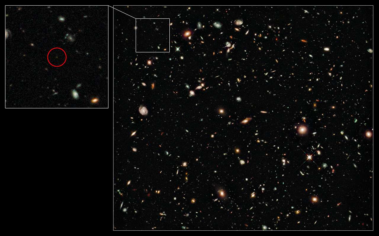 Le cercle rouge entoure la galaxie UDFy-38135539, la plus lointaine connue à ce jour. © Nasa, Esa, G. Illingworth (UCO/Lick Observatory et University of California, Santa Cruz), HUDF09 Team