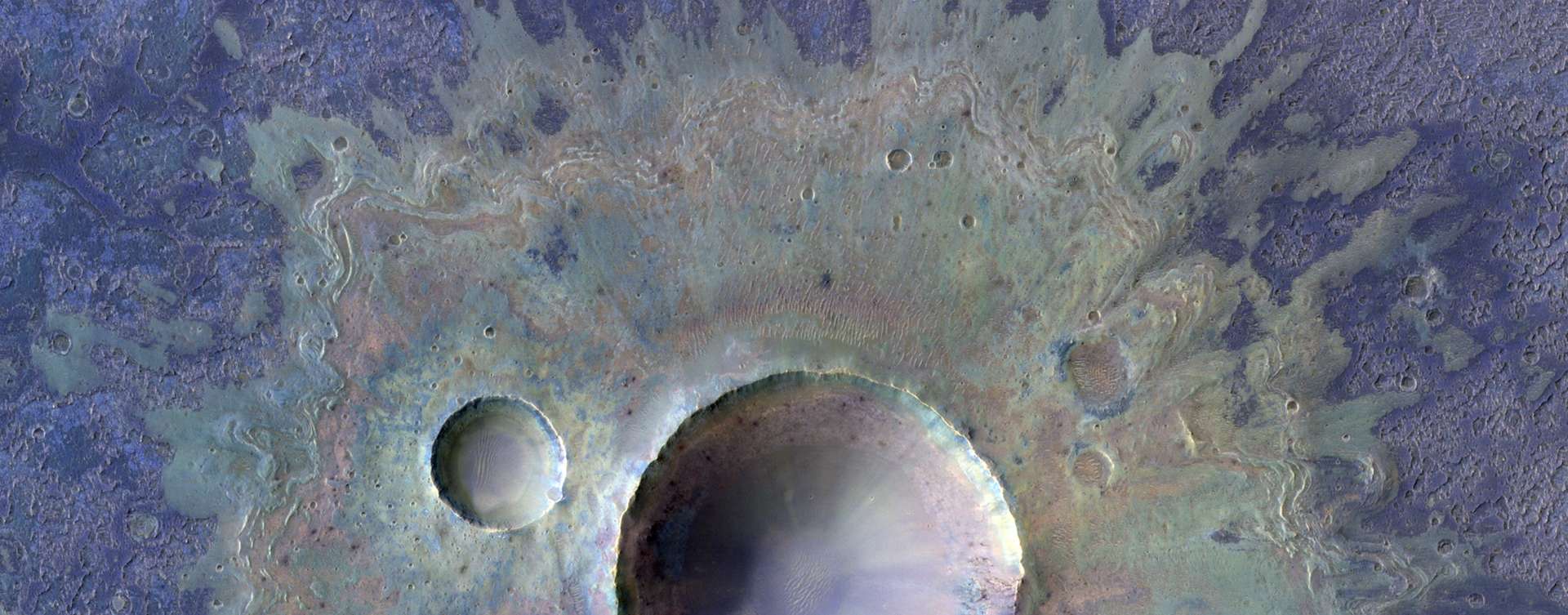 This magnificent crater reveals the presence of water ice on Mars.