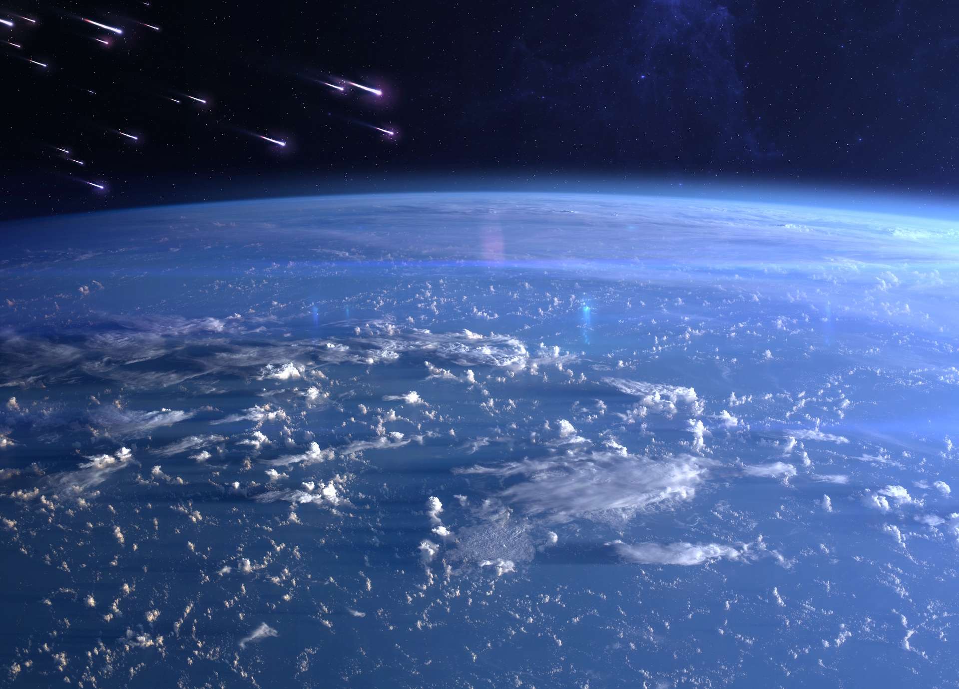 Illustration de poussières d'un essaim météoritique se jetant sur l'atmosphère terrestre. Vu du sol, leur direction d'origine dans le ciel est le radiant. © revers_jr, Adobe Stock
