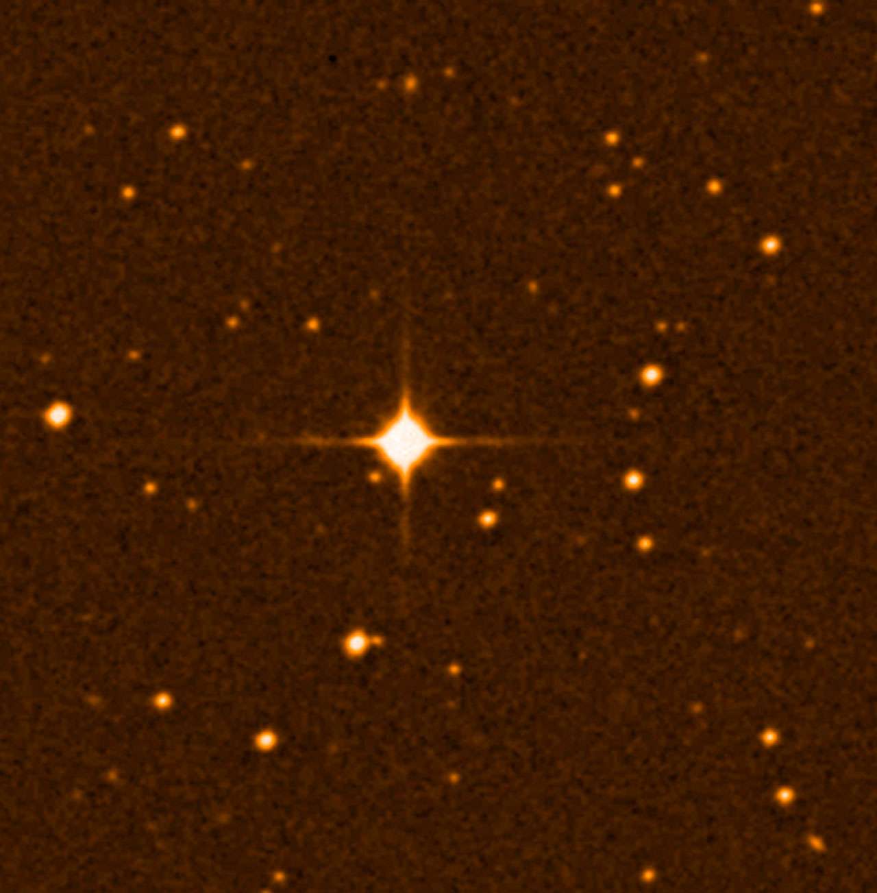 Gliese 581 est une étoile naine rouge située dans la constellation de la Balance, à 20,5 années-lumière du Système solaire. Il s'agissait en janvier 2009 de la 87e plus proche étoile connue. Six exoplanètes ont été détectées autour de Gliese 581, dont deux, Gliese 581 c et Gliese 581 d, sont les premières exoplanètes à avoir été trouvées dans la zone habitable de leur étoile. © Wikipédia, ESO
