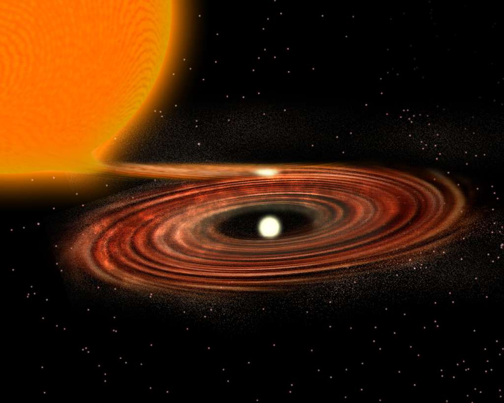 Lorsqu'un astre compact, comme une naine blanche ou un trou noir, est suffisamment proche d'une étoile, il lui arrache de la matière pour former un disque d'accrétion. Le même phénomène doit se produire lorsqu'une étoile à neutrons possède une orbite qui la conduit à pénétrer dans une géante rouge. Il peut alors se former ce qu'on appelle un objet de Thorne-Zytkow. © P. Marenfeld, NOAO, Aura, NSF