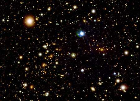 Cliquez pour agrandir. Le bullet cluster est l'un des amas pris dans le courant noir. Crédit : Nasa/STScI/Magellan/U.Arizona/D.Clowe et al.