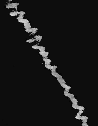 Gros plan sur la trace laissée par Spoutnik 2 lors de sa rentrée. © Nasa