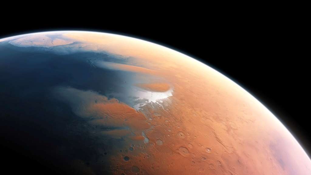 Cette illustration suggère l’environnement humide de Mars voici 4 milliards d’années. La toute jeune planète devait renfermer suffisamment d’eau liquide pour que l’intégralité de sa surface en soit couverte, sur une hauteur d’environ 140 m. Il semble plus probable toutefois que l’eau liquide se soit constituée en un océan occupant près de la moitié de l’hémisphère nord de la planète. En certaines régions, sa profondeur pouvait dépasser 1,6 km. © ESO, M. Kornmesser