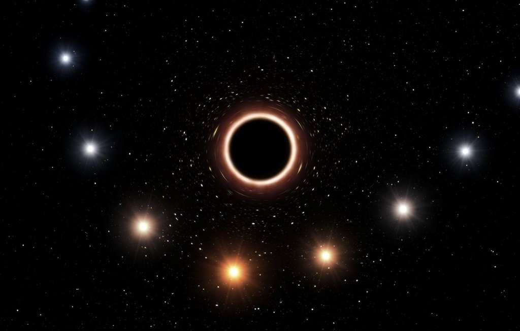 Sur cette vue d’artiste figure la trajectoire de l’étoile S2 passant à proximité du trou noir supermassif situé au centre de la Voie lactée. À mesure qu’elle s’approche du trou noir, l’étoile arbore une couleur toujours plus rougeâtre. Cet effet, prédit par la théorie de la relativité générale d’Einstein, résulte de la présence d’un champ gravitationnel très intense. Sur ce graphe, le rougissement ainsi que la taille des objets ont été volontairement exagérés. © ESO/M. Kornmesser