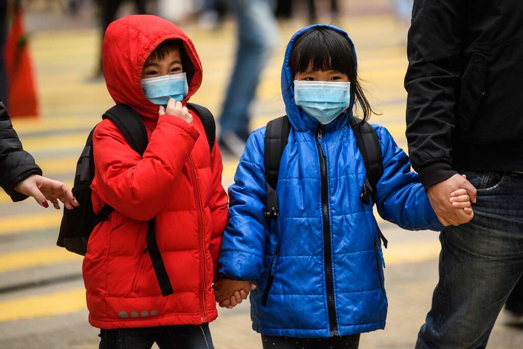 Les enfants ne seraient moins infectés et pas aussi contagieux qu'on l'a pensé au début de la pandémie de Covid-19. © Anthony Wallace, AFP