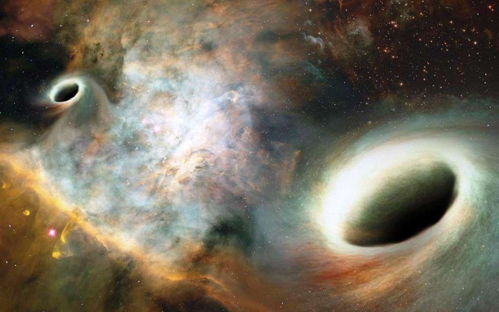 Une vue d'artiste de deux trous noirs supermassifs formant un système binaire. © Joshua Valenzuela, UNM
