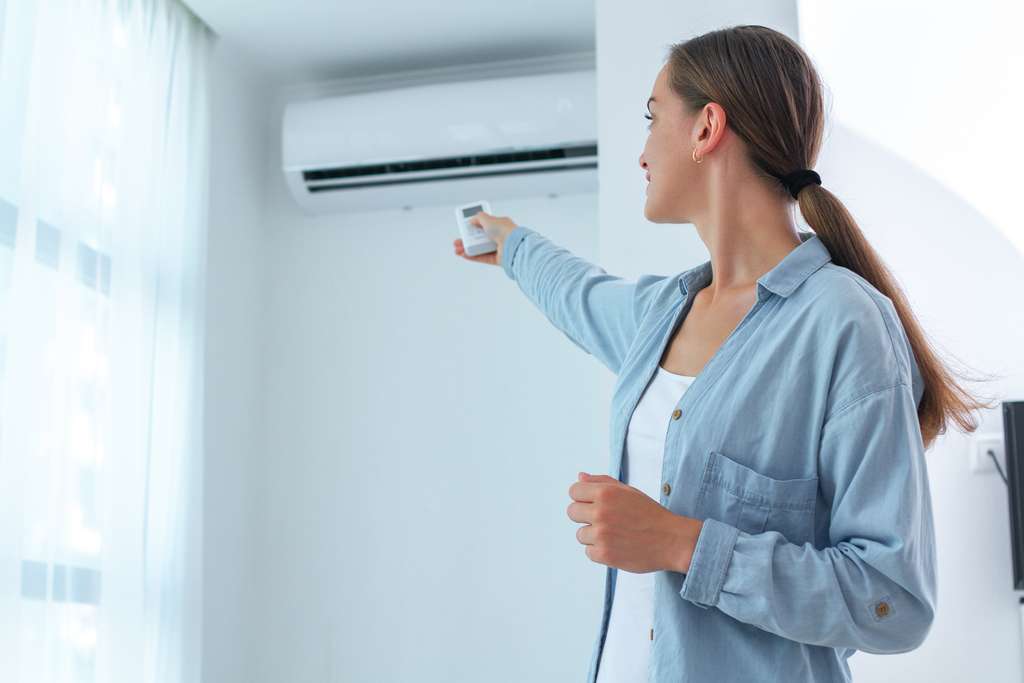 Une climatisation réversible pour faire des économies. © Goffkein, Adobe Stock