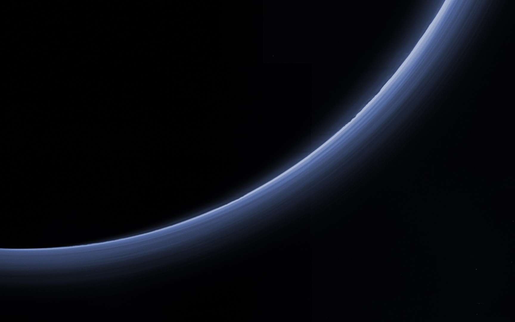 Pluton à contre-jour photographiée par la sonde New Horizons. © Nasa, JHUAPL, SwRI