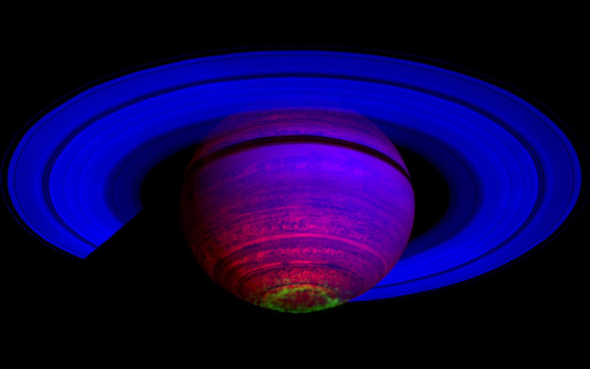 Image composite en fausses couleurs laissant apparaître en vert un cercle d'aurores au pôle Sud de Saturne. © Nasa, JPL, ASI, University of Arizona/University of Leicester