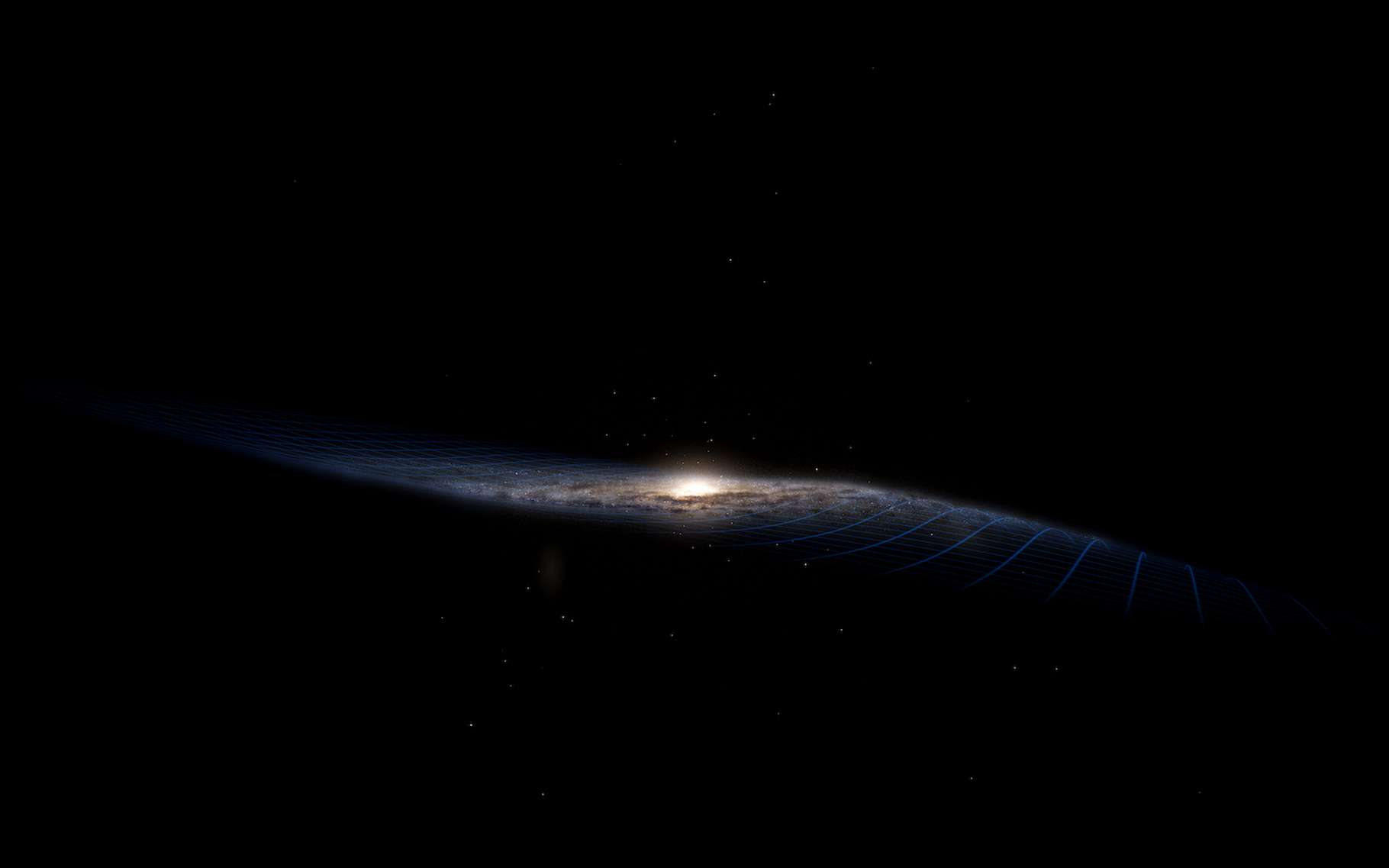 Le disque de notre Voie lactée n’est pas plat. Et des chercheurs de l’Agence spatiale européenne (ESA) pensent qu’il est voilé à cause d’une collision avec une autre galaxie plus petite. © Stefan Payne-Wardenaar, ESA