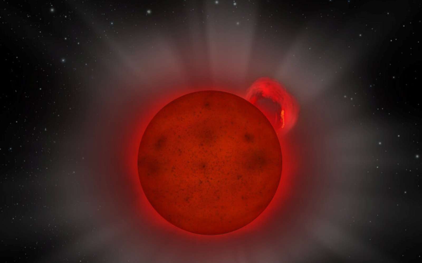 Impression d'artiste d'une étoile naine L, une étoile avec si peu de masse qu'elle se trouve juste au-dessus de la limite pour être réellement une étoile, prise en train d'émettre une énorme éruption de rayons X, détectée par le satellite XMM Newton de l'ESA. © ESA