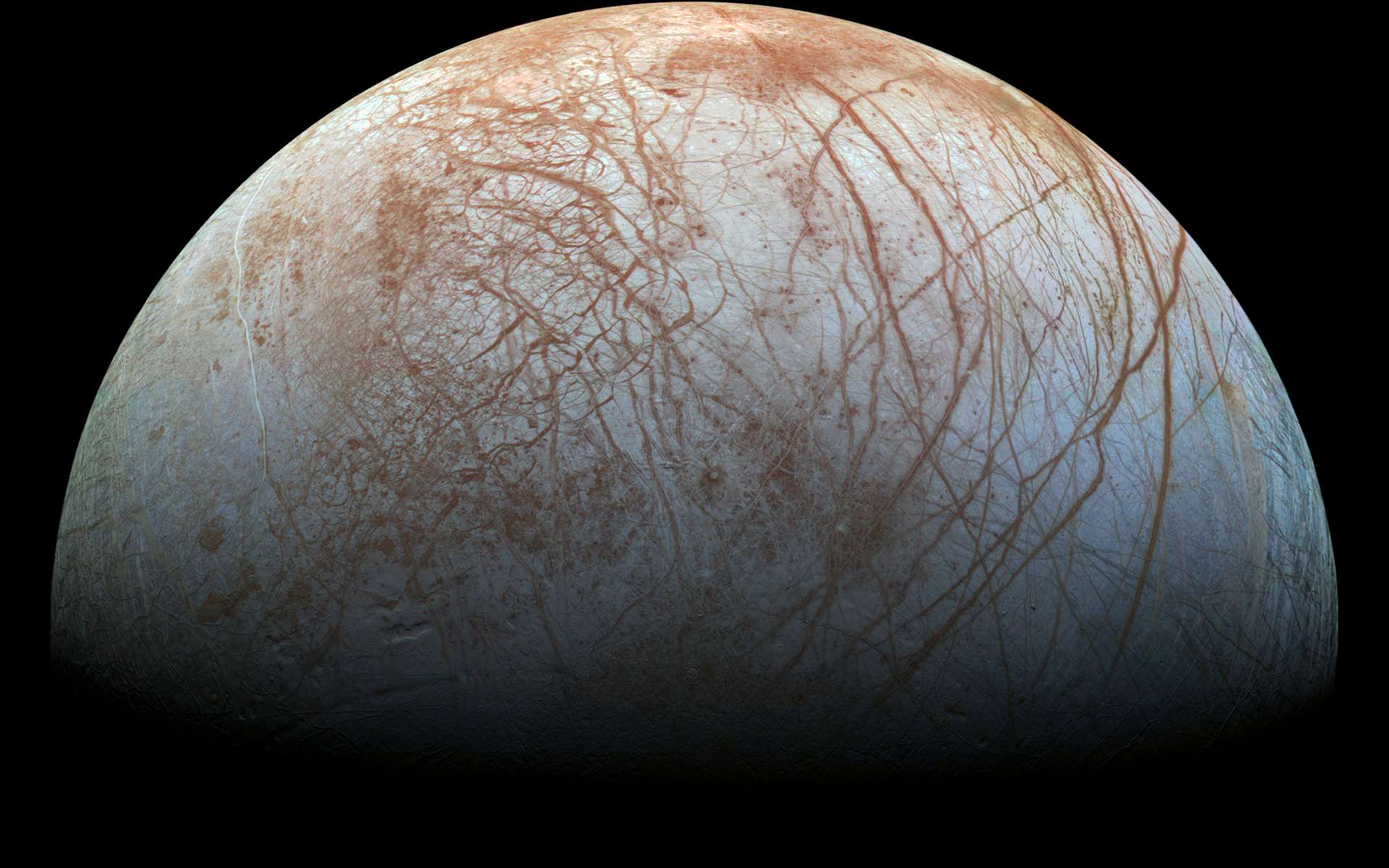 De nombreuses fissures craquèlent la surface d'Europe, l'un des quatre grands satellites de Jupiter © Nasa, JPL-Caltech, Seti Institute