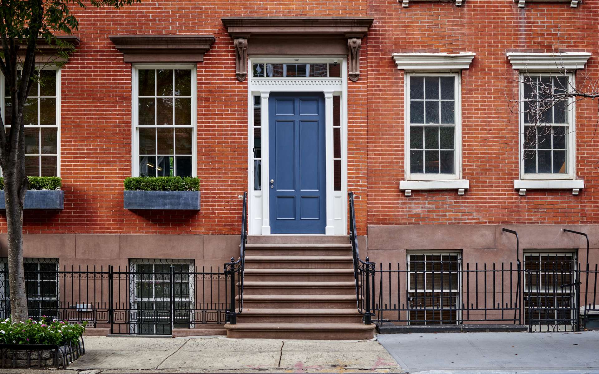La transaction immobilière de cette résidence luxueuse avec sa façade de briques se fera-t-elle en cryptomonnaie d'ici cinq ans ? © goodmanphoto, Adobe Stock
