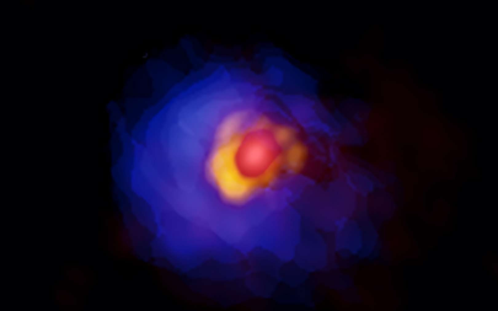 Image d'Alma de la proto-étoile massive G353.273 + 0.641. Les émissions de la proto-étoile centrale, du disque et de l’enveloppe gazeuse sont indiquées en rouge, jaune et bleu. L'asymétrie dans le disque est clairement montrée avec les observations Alma haute résolution. © Alma (ESO/NAOJ/NRAO), Motogi et al.