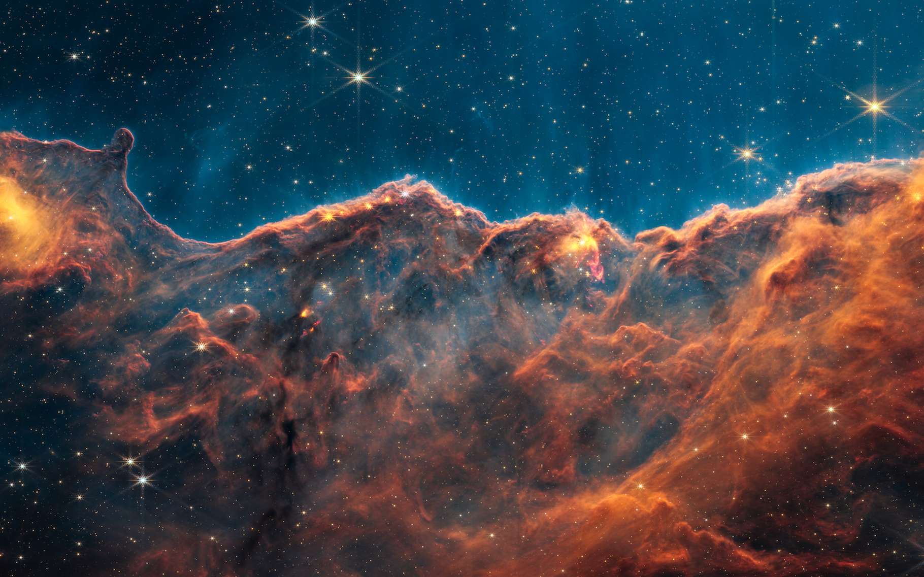 Les superbes « falaises cosmiques » dévoilent leurs secrets au télescope James-Webb thumbnail