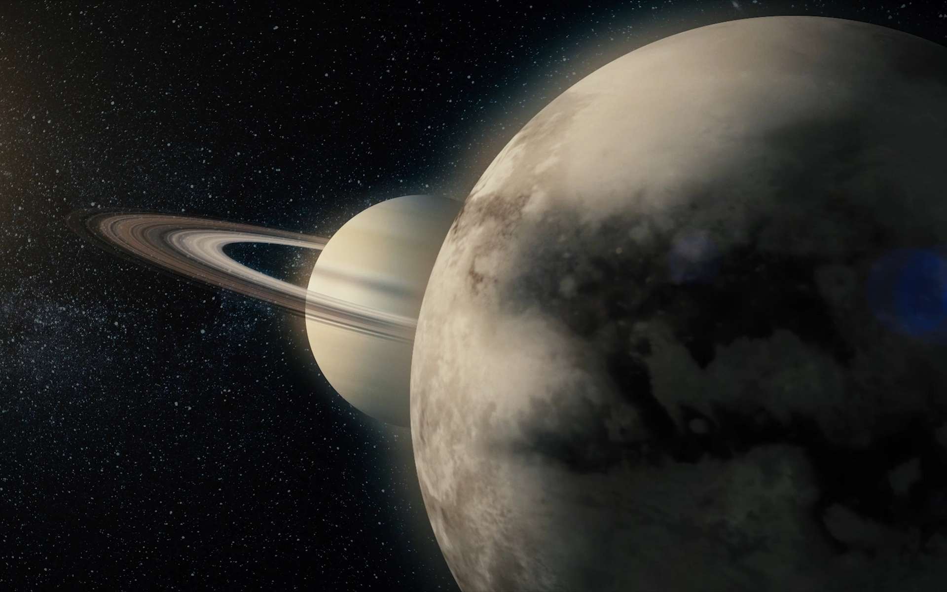 Représentation de Saturne et de sa lune Titan. © Media Whalestock, Adobe Stock