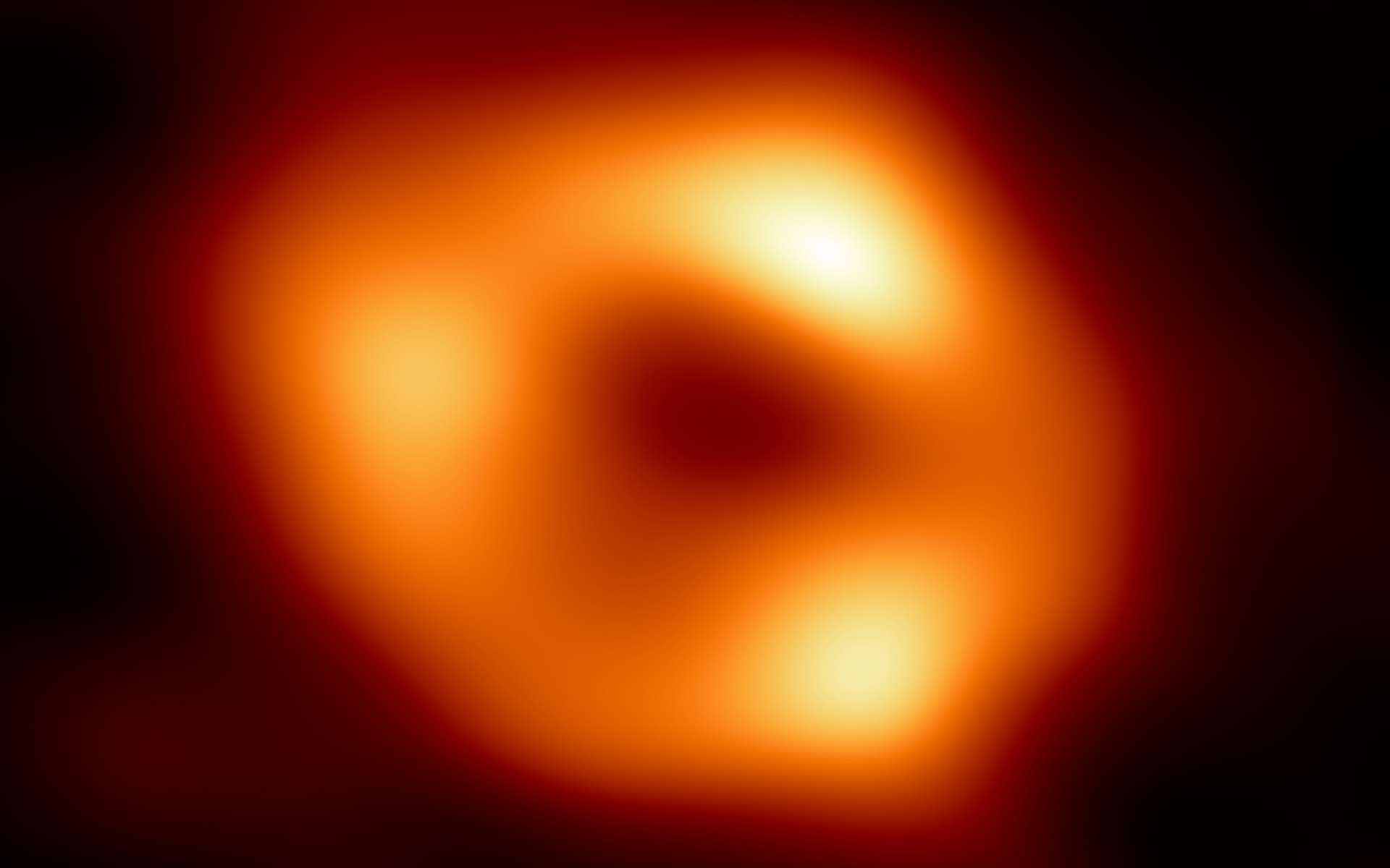 La nouvelle méthode trouvée par les chercheurs s'applique pour les systèmes binaires constitués de deux trous noirs supermassifs. Le trou noir central de la Voie lactée, sur cette image, ne serait pas détectable par cette technique. © Nasa