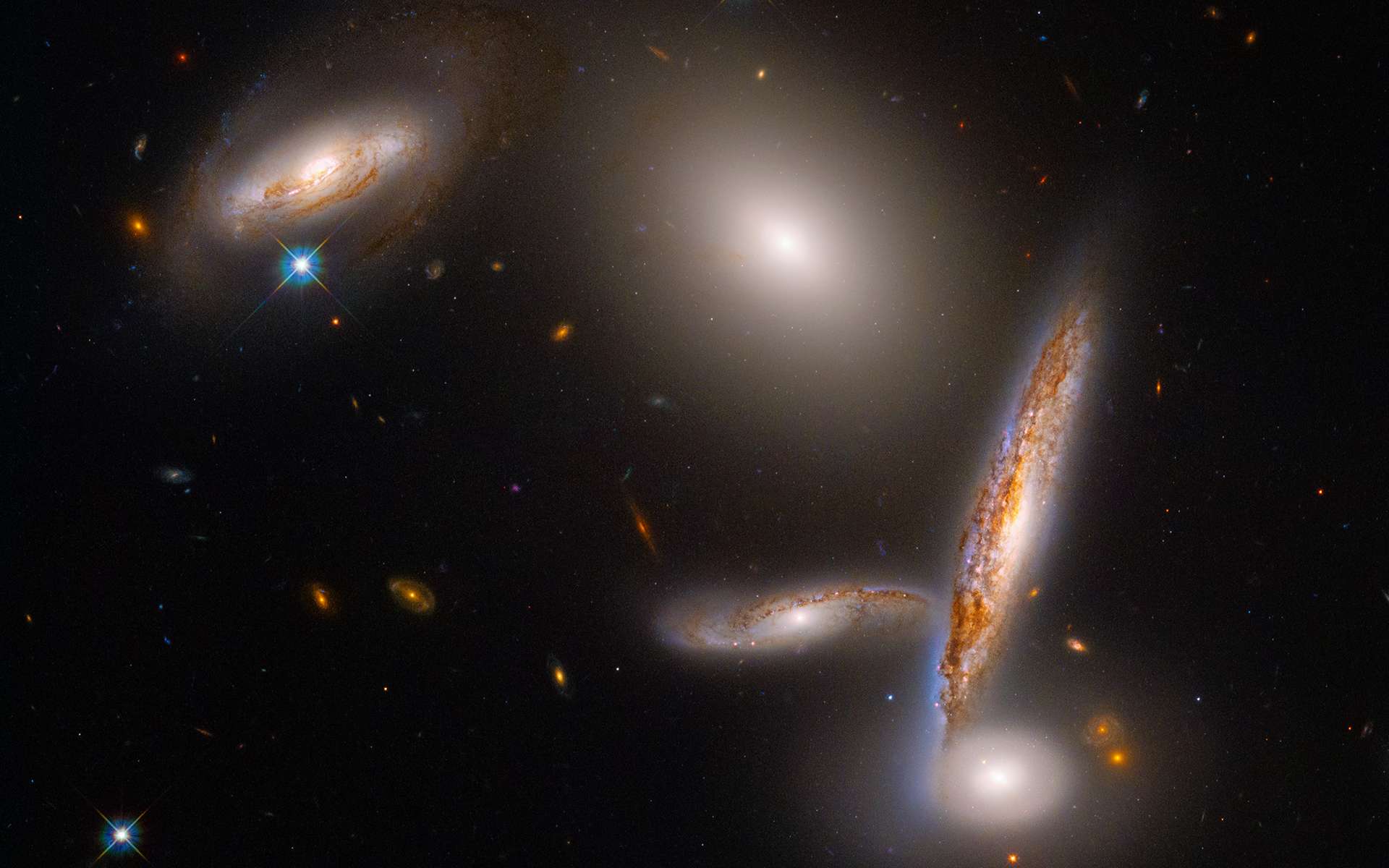 On its 32nd birthday, Hubble spied on 5 amazing galaxies that will merge!