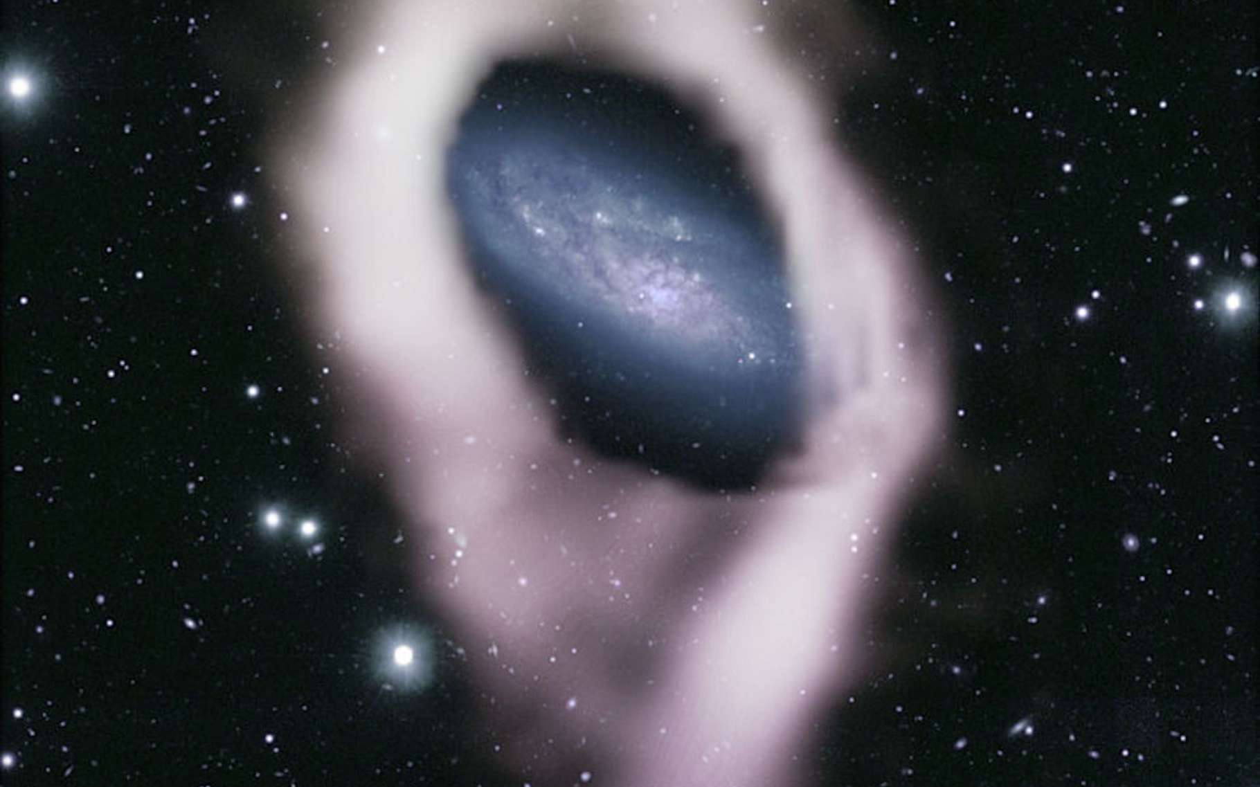 Les astronomes ont découvert que cette galaxie spirale en cache une autre !