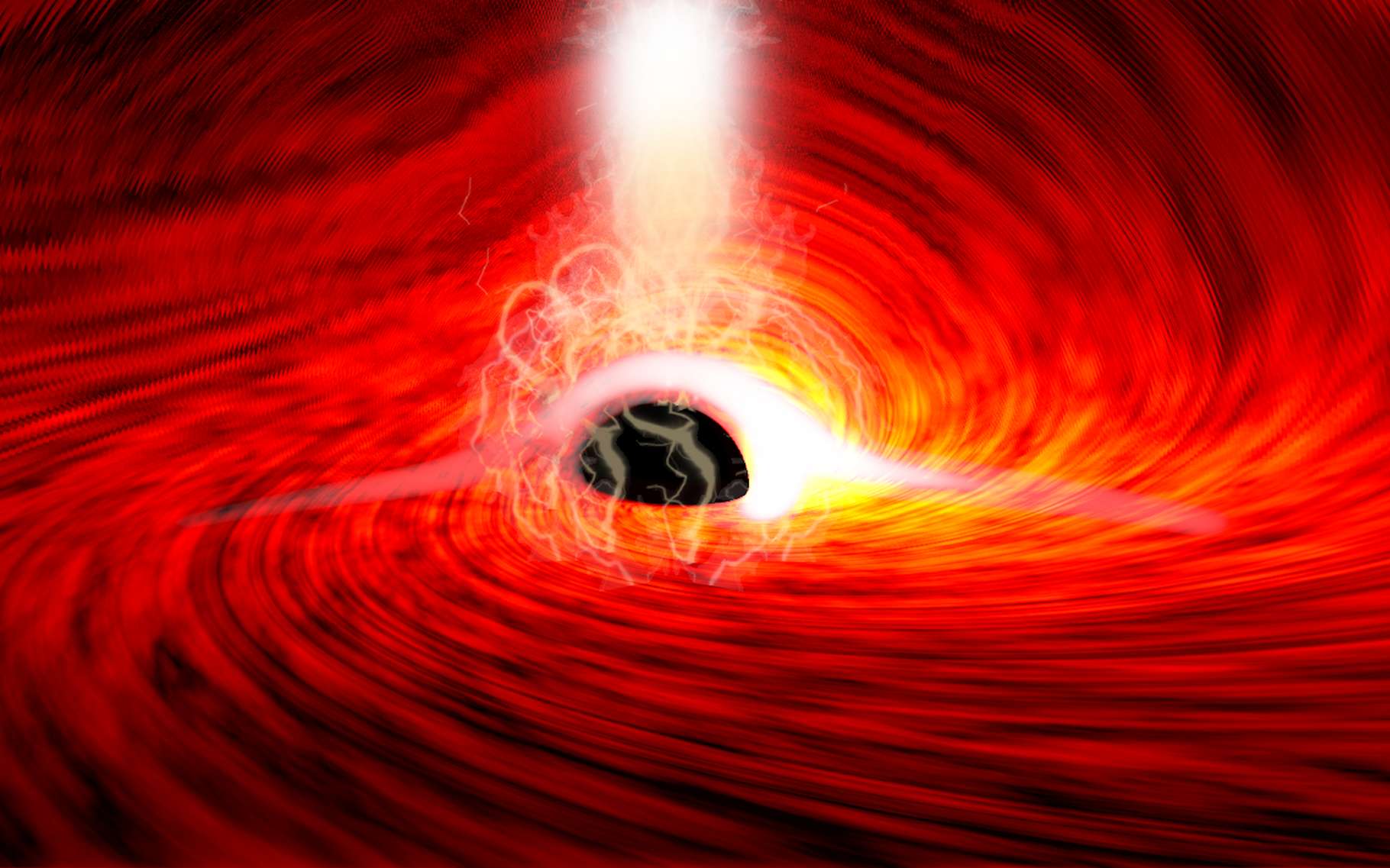 Grâce aux observatoires spatiaux NuSTAR (Nasa) et XMM-Newton (ESA), des chercheurs de l’université de Stanford ont, pour la première fois, observé de la lumière – des rayons X plus exactement – issue de derrière un trou noir. © Dan Wilkins, Université de Stanford