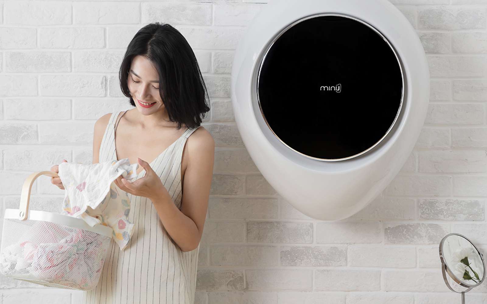 La machine à laver murale MiniJ, de Xiaomi, a une capacité de 3 kg. © youpin.mi.com