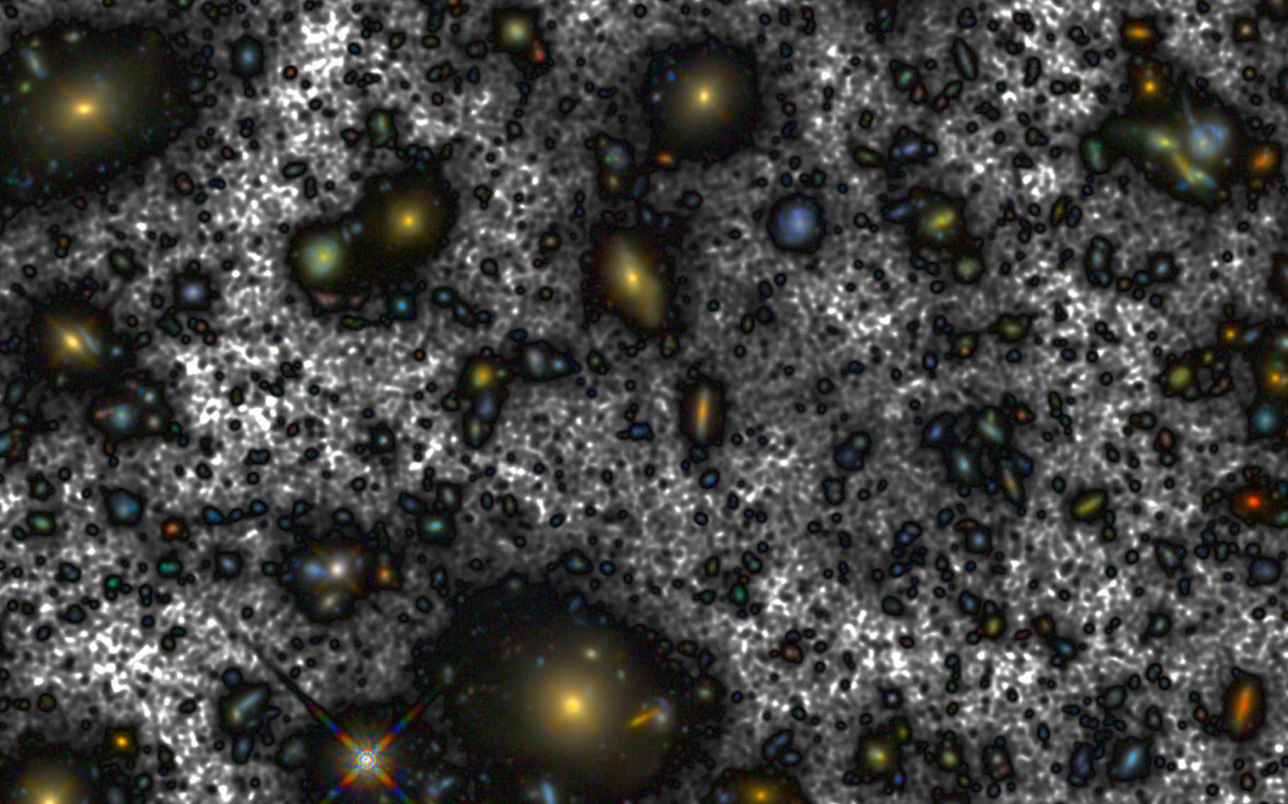 Des chercheurs publient l’image la plus profonde de l’univers jamais captée depuis l’espace. En gris foncé, la lumière révélée autour des galaxies dans ce champ. Cette lumière correspond à la luminosité de plus de cent milliards d’étoiles. © A.S. Borlaff et al., Institut d’astrophysique des Canaries