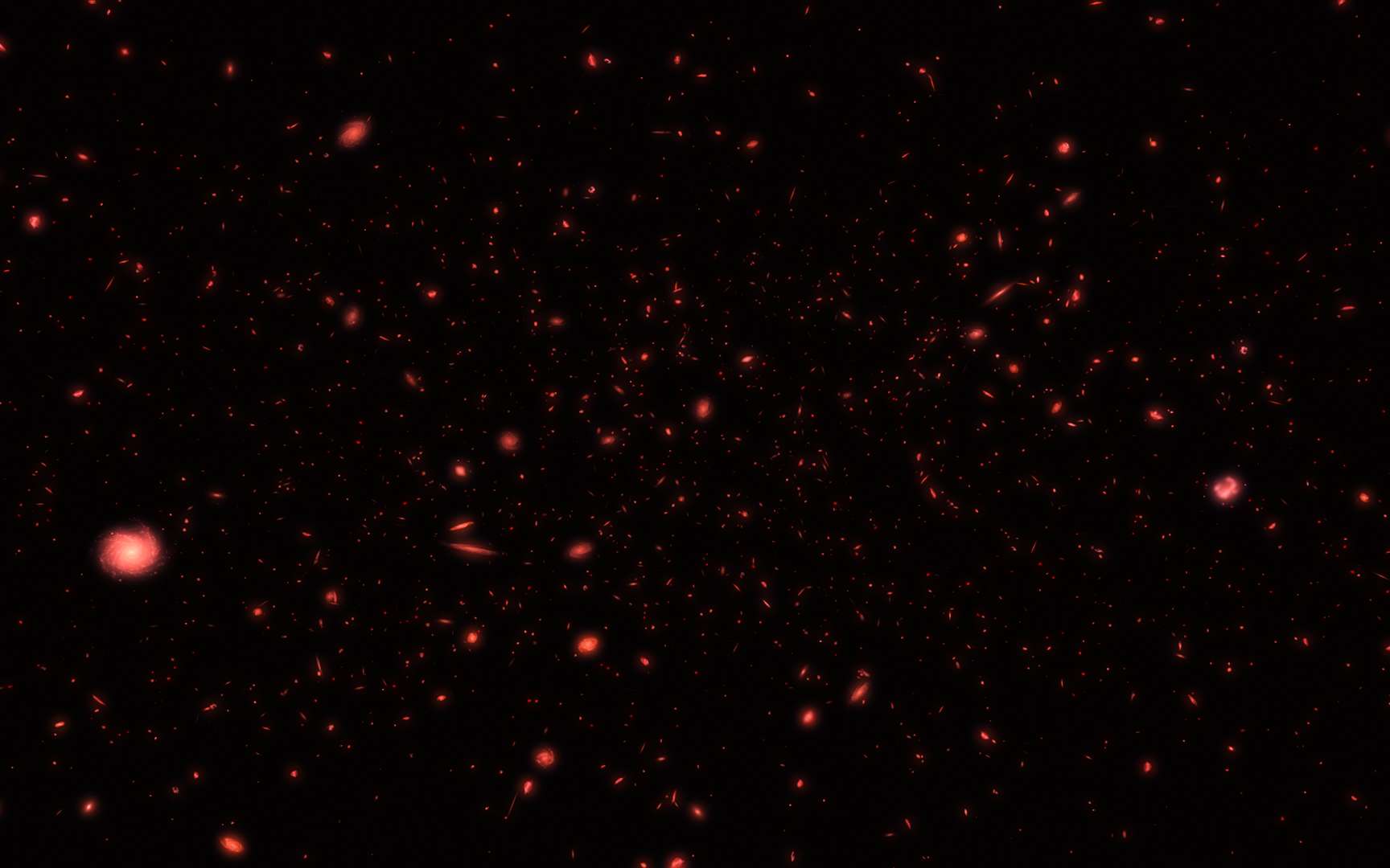 Une vue d'artiste des premières galaxies après le Big Bang observées dans l'infrarouge. © ESA/Hubble, M. Kornmesser and Nasa