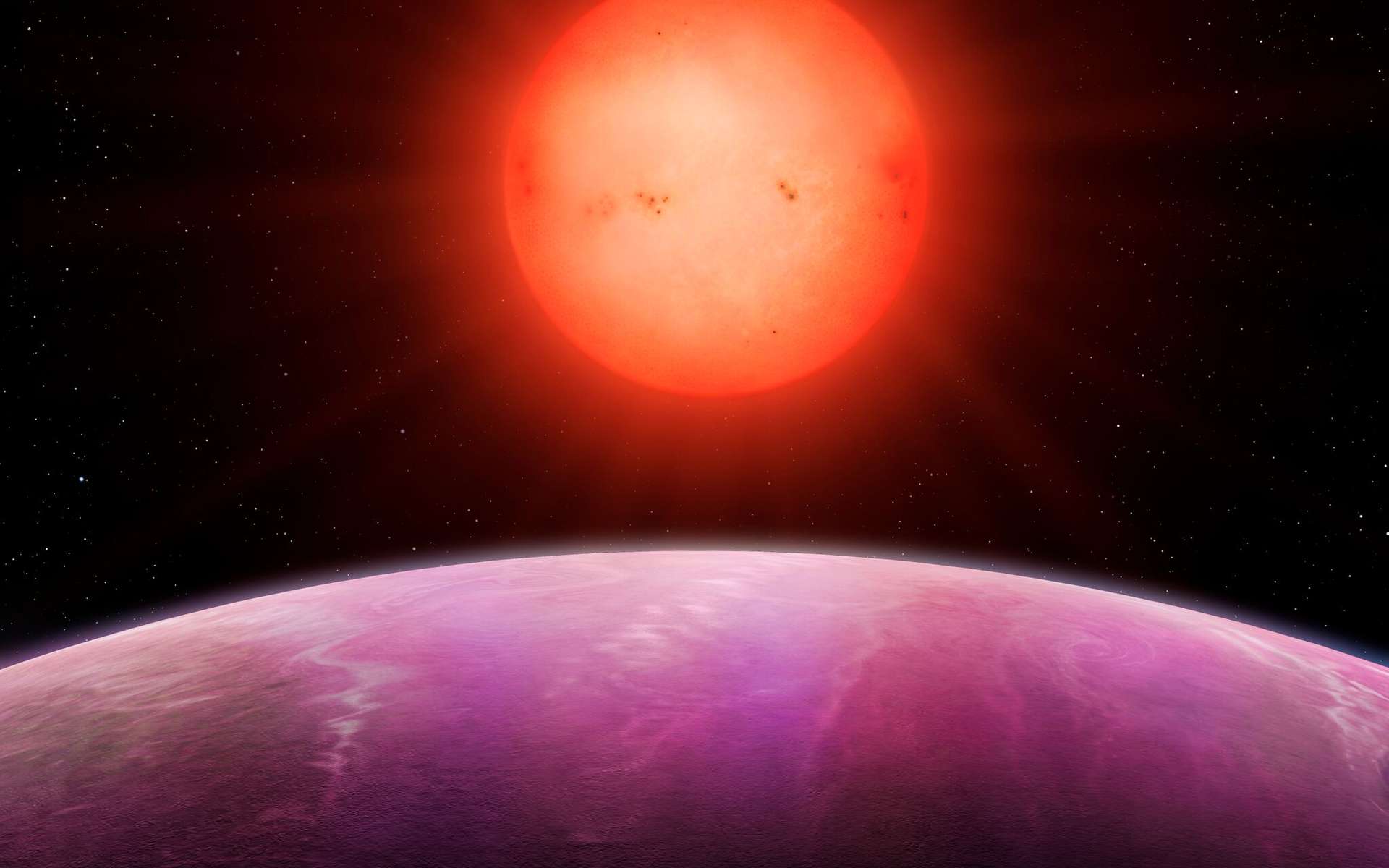 Une planète monstre a été découverte. Ici, une vue d'artiste de l'exoplanète NGTS-1b autour de sa naine rouge de type M. © Mark Garlick, University of Warwick