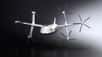 Doté d'ailes rotatives à six rotors, le drone peut décoller et atterrir verticalement, puis voler comme un avion, mais pas plus de huit minutes.