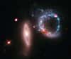 En ce Mois de l'amour, il semble qu'un coin du ciel ait été touché par une des flèches de Cupidon. L'observatoire Chandra a en effet photographié un anneau brillant composé d'étoiles et de trous noirs.