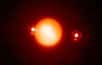 La nuit du 19 au 20 décembre 2001, Titan, le plus gros satellite de la lointaine Saturne, a occulté NV0435215+200905, une étoile de classe K. L'événement était visible depuis sept observatoires astronomiques, dont le célèbre télescope Hale du Mont Palomar, qui resta durant plus de quatre décennies le plus grand réflecteur du monde avec son miroir de 5,08 mètres de diamètre. Leslie Young, du Southwest Research Institute, était chargé de la coordination de cette observation peu commune.