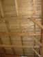 Le carrelet est un élément de fixation en bois, de forme carrée mis en place sur les poutres pour aider au support des combles ou du plafond. © Arbre évolution, CC BY-SA 2.0, Flickr