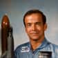 Pilote d'essais, ingénieur et colonel de l'Armée de l'air.
Il est sélectionné comme astronaute par le CNES en 1980. Il a suivi l'entraînement et la préparation aux vols spatiaux à la « cité des étoiles », pendant 2 ans, avec Jean-Loup Chrétien dont il fut la doublure lors du PVH (Premier vol habité français). Il fait partie de la mission STS-51G du 17 au 24 juin 1985 comme spécialiste charge utile. Il devient le second astronaute français à être allé dans l'espace lors du premier vol spatial franco-américain.