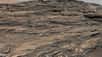 Après avoir exploré durant un an la première couche sédimentaire à la base du Mont Sharp, sur Mars, le rover Curiosity visite à présent un environnement constitué de dunes de sable pétrifiées, lesquelles sont façonnées par le vent depuis plus de trois milliards d’années.