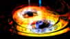 Wise J233237.05-505643.5 est une énigmatique source infrarouge détectée jadis par le Wide-Field Infrared Survey Explorer (Wise). Observée dans le domaine radio, elle se présente comme un noyau actif de galaxie avec un curieux jet en spirale. Selon les chercheurs, il pourrait s'agir de deux trous noirs supermassifs destinés à fusionner. Il s'agirait donc d'un excellent laboratoire pour étudier ce phénomène, que l'on pense relativement fréquent dans l'histoire du cosmos observable.