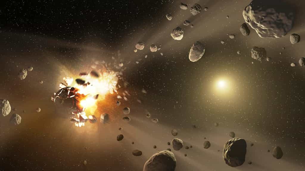 Une vue d'artiste montrant la collision violente entre deux astéroïdes. De nombreux débris sont produits, dont certains retomberont un jour sur Terre avec, peut-être, des quasi-cristaux. © Nasa