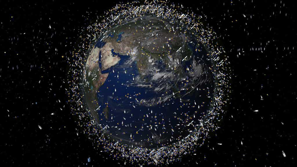Représentation artistique de la population des satellites et des débris spatiaux en orbite autour de la Terre. © ESA