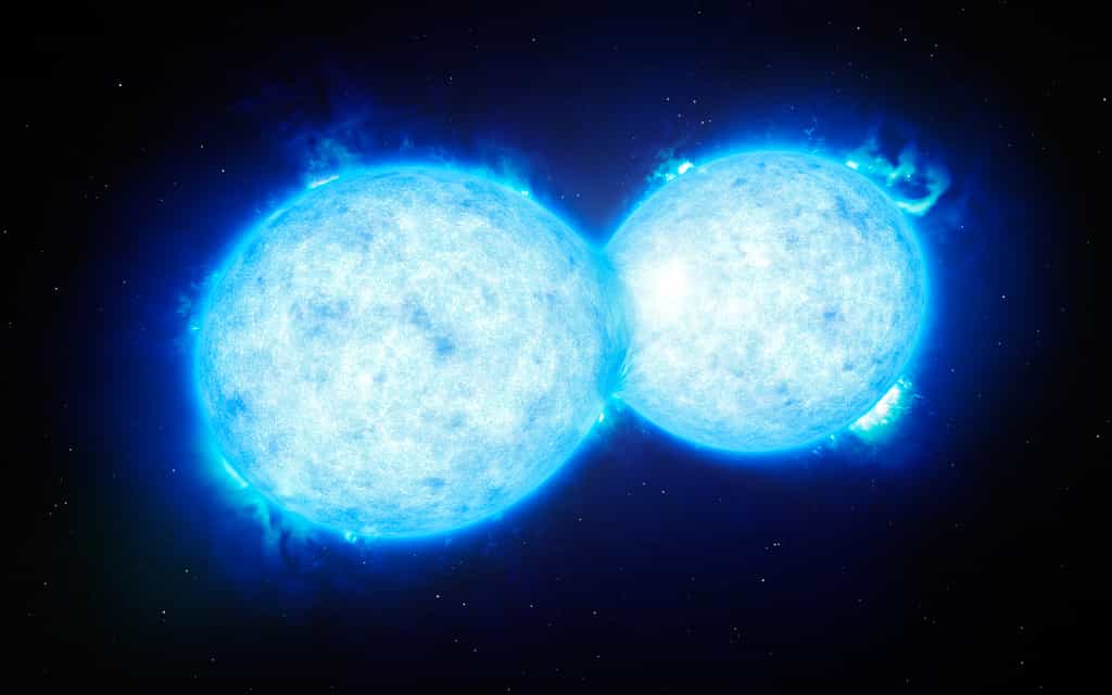 Cette vue d’artiste montre VFTS 532 – le système d’étoile double le plus chaud et le plus massif connu à ce jour –, dont les composantes, proches l’une de l’autre, partagent du contenu matériel. Les deux étoiles de ce système extrême se situent à quelque 160 000 années-lumière de la Terre, dans le Grand Nuage de Magellan. Cette étrange paire s’achemine certainement vers une fin dramatique : la formation d’une unique étoile géante ou d’un futur trou noir binaire. © ESO, L. Calçada