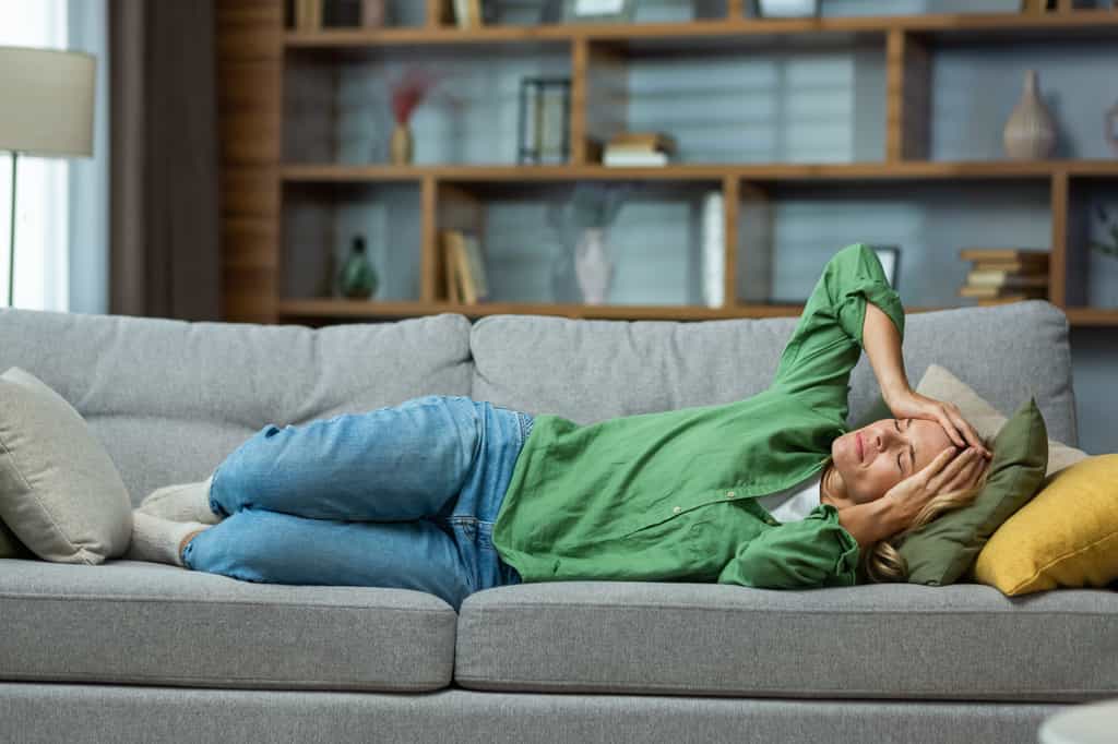 La fatigue est l'un des symptômes les plus fréquents du Covid long. © Liubomir, Adobe Stock