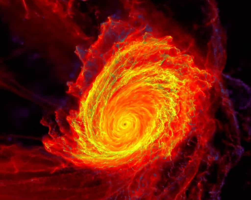 Cette image tirée de la simulation montre un trou noir supermassif derrière un quasar, entouré d'un disque tourbillonnant de matière appelé disque d'accrétion. © Caltech, Phil Hopkins Groupe