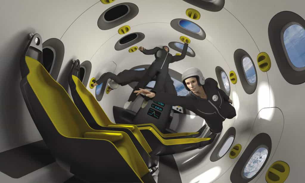 Une vue d'artiste de l'intérieur d'un avion spatial (ici le SpacePlane d'Astrium) au sommet de la trajectoire parabolique à 100 kilomètres d'altitude. Les passagers sont en apesanteur pour quelques minutes et admirent la Terre par les hublots. © EADS Astrium/Marc Newson Ltd