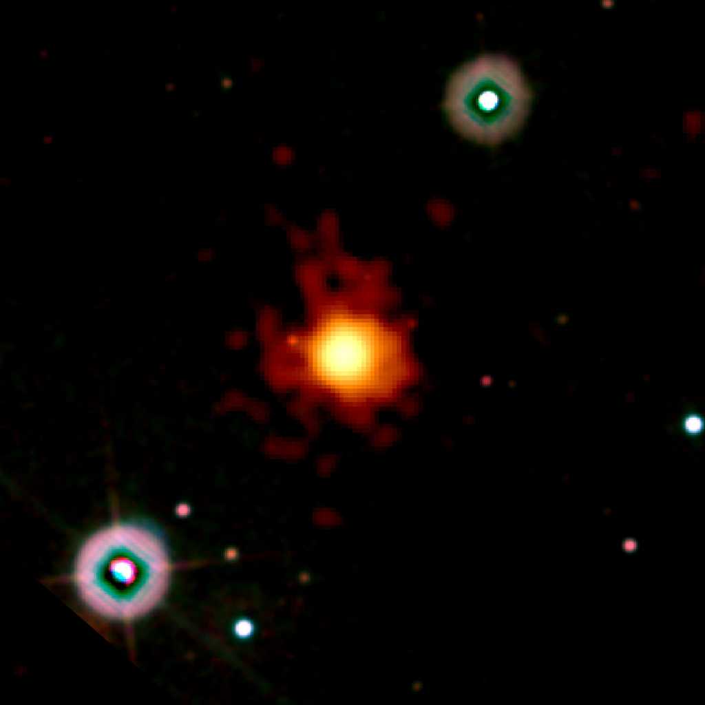 Cette image combine les données de la Swift en ultraviolet (bleu), visible (vert) et dans le domaine des rayons X (orange, rouge). Le sursaut gamma au centre n'est pas dans le domaine de la  lumière visible, ce qui implique qu'il s'est produit à une grande distance. L'image correspond à un champ de 6,3 minutes d'arc de côté. Crédit : NASA/Swift/Stefan Immler 