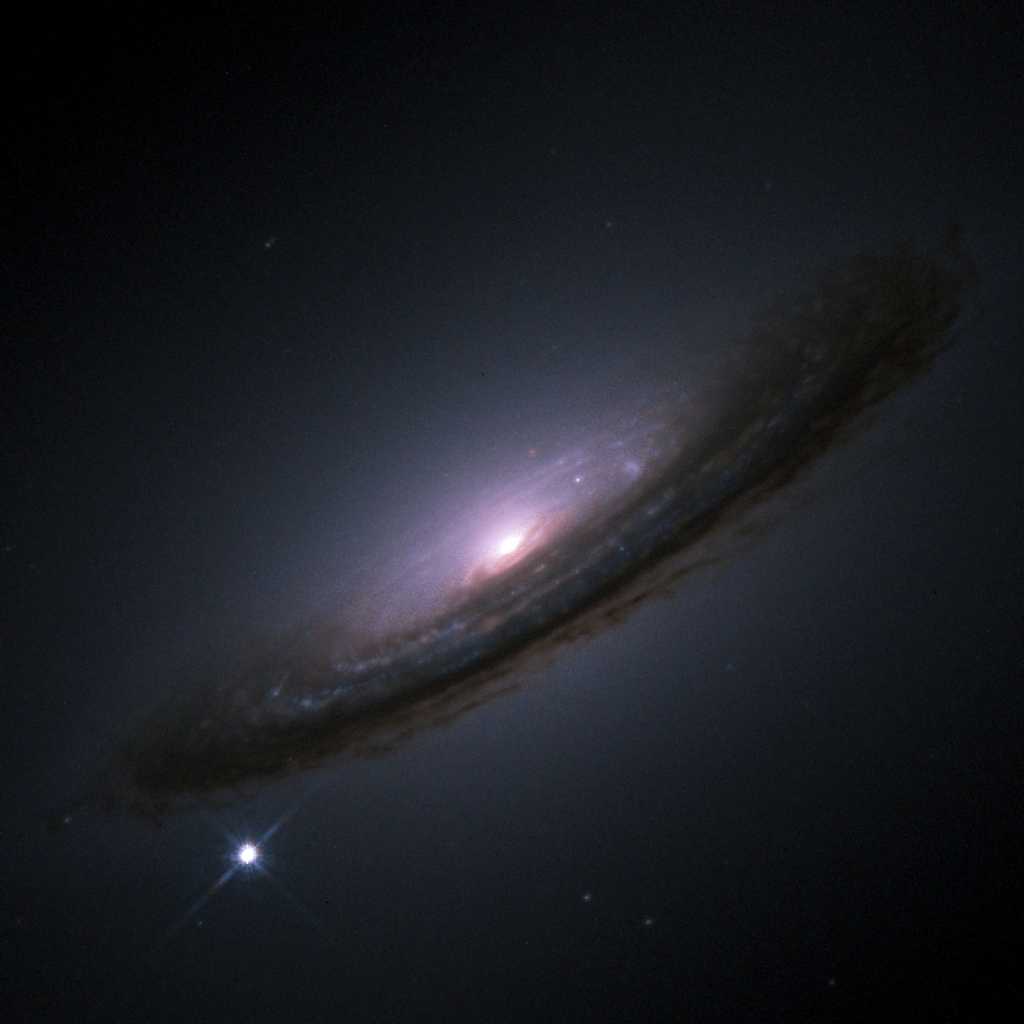 La supernova sur cette image se nomme SN 1994D. Elle a été observée avec le télescope Hubble dans la galaxie NGC 4526. De telles supernovae peuvent servir à étudier des variations dans le temps de l'énergie noire, mais aussi de la constante de la gravitation de Newton. © Nasa, Esa, Hubble Key Project Team, High-Z Supernova Search Team