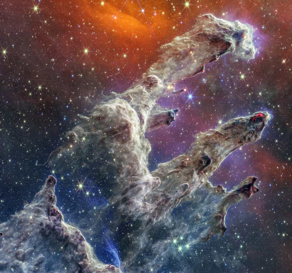 Cette magnifique image des Piliers de la Création est la composée de deux images renvoyées par le télescope spatial James-Webb dans l’infrarouge proche et moyen. © Nasa, ESA, CSA, STScI, J. DePasquale (STScI), A. Pagan (STScI), A. M. Koekemoer (STScI) ; CC by 4.0