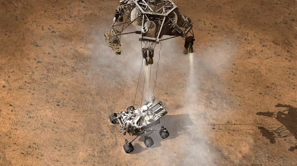 Trois sondes ne seront pas de trop pour surveiller l'atterrissage de Curiosity qui terminera sa descente accroché à une sorte de grue qui le posera sur le sol. © JPL-Caltech, Nasa
