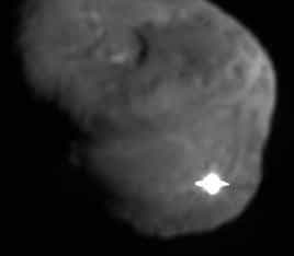 Collision entre l'impacteur et la comète Tempel 1(Crédits : NASA/JPL)
