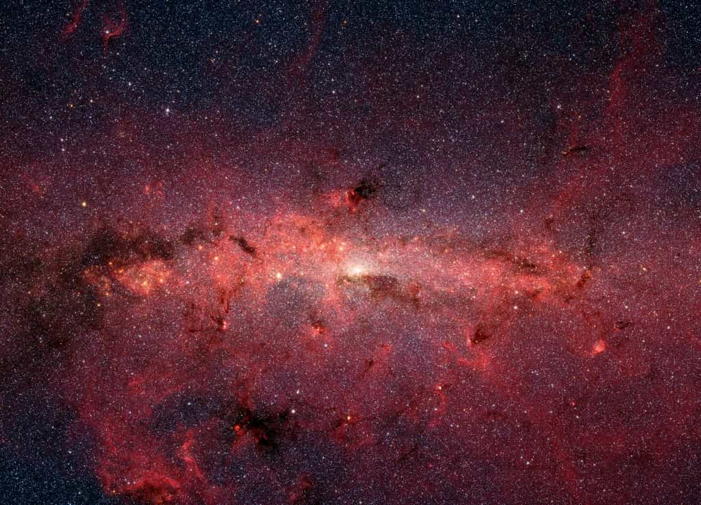 Dans l’univers, les étoiles se structurent en galaxies, en amas et en superamas. Ici, le cœur de la Voie lactée, vu en infrarouge. À grande échelle, la structure de l'univers est dite « lacunaire », car majoritairement constituée de vide cosmique. © Nasa/JPL-Caltech/S. Stolovy (SSC/Caltech)