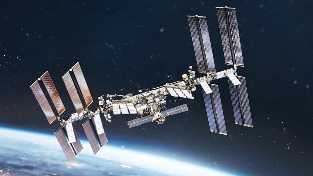 La Station spatiale internationale en orbite autour de la Terre. © dimazel, Adobe Stock